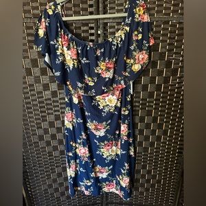 Off the shoulder ruffled knee length dress.